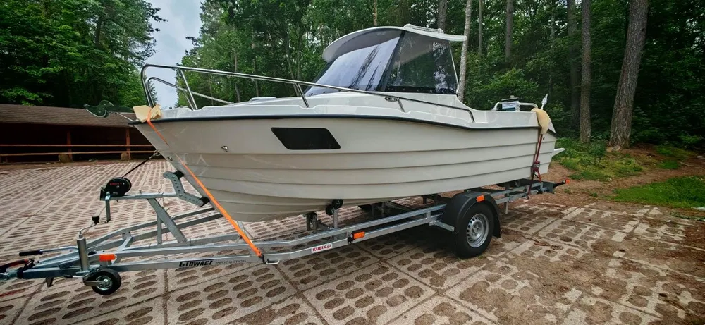 Łódź Lakeman 540 Pilothouse Classic - NOWA 2025r + Przyczepa Brenderup - obrazek 9